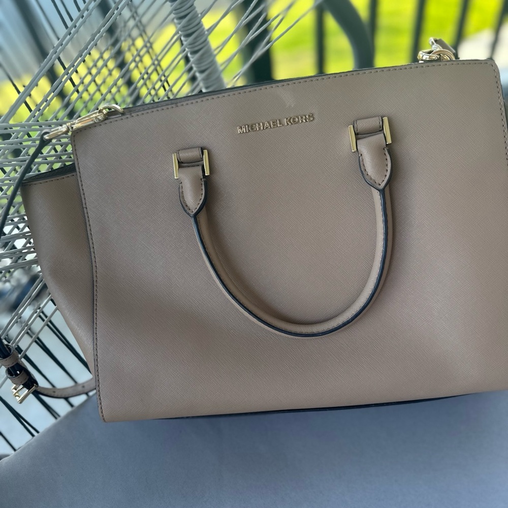 Black Leather Satchel with Top Handle and Zipper Closure